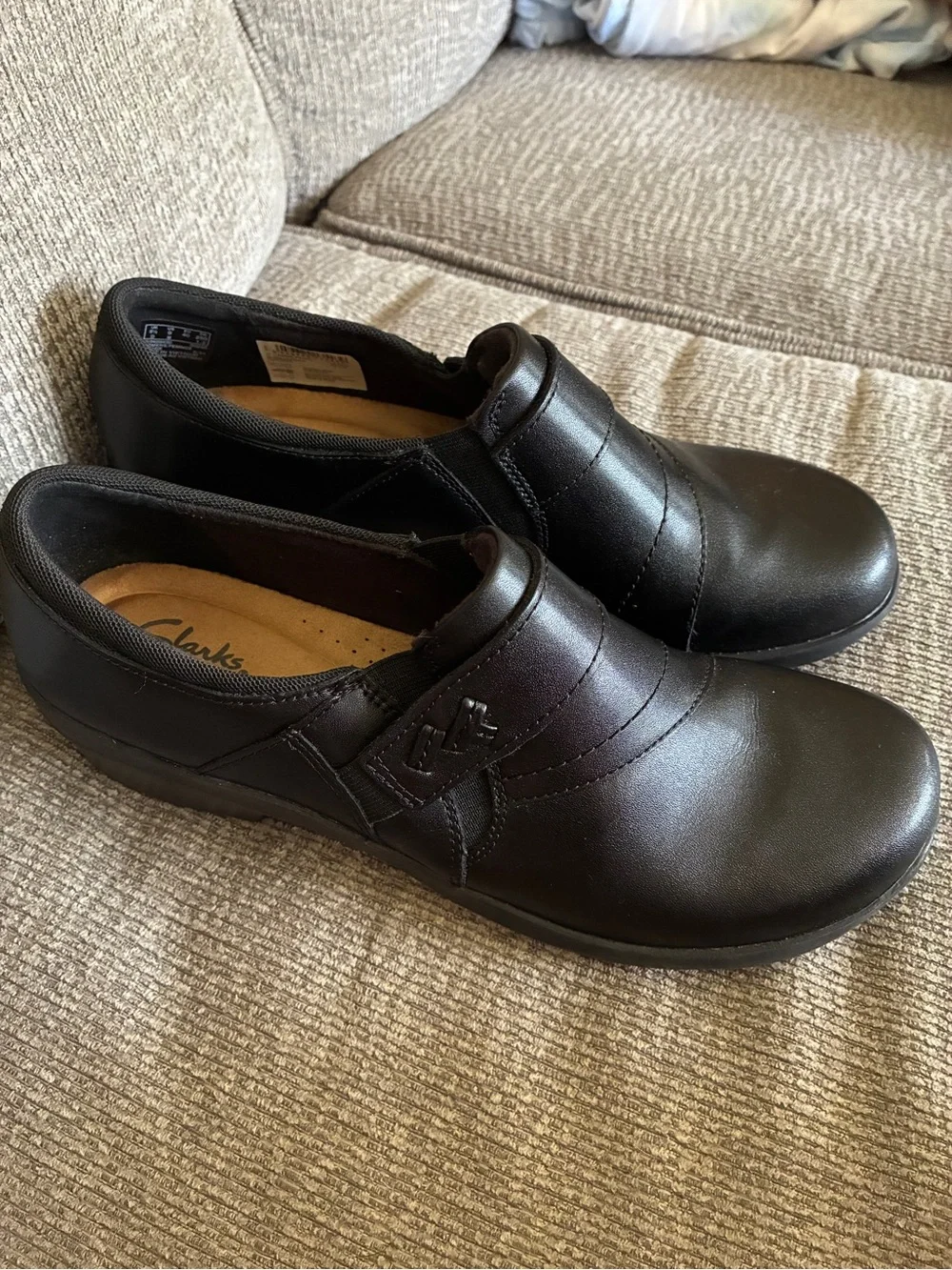 Clarks Women’s Black Slip-On Leather Shoes